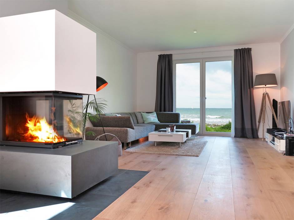 Heizungsarten, Heizung, Kamin, Ofen, Wohnzimmer mit modernem Kaminofen, Foto: Wilm Ihlenfeld / fotolia.de
